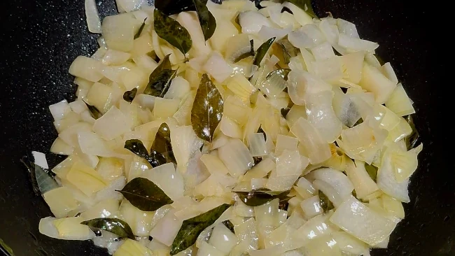 onions browning with curry leaves
