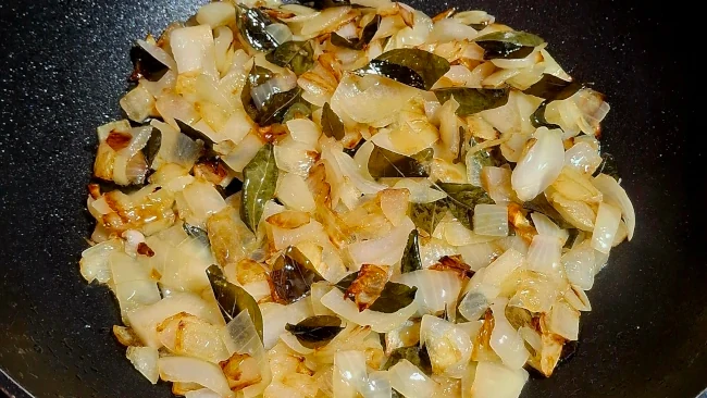 onions browning with curry leaves