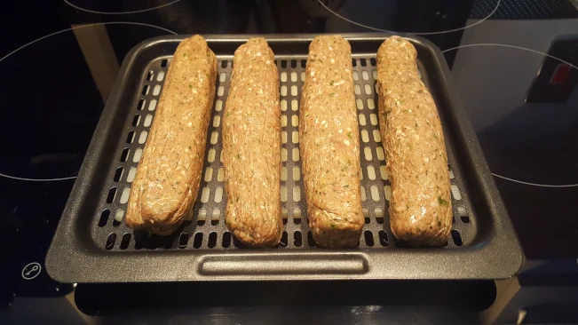 raw kebabs on grill plate