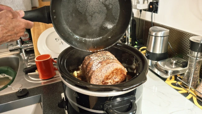 tipping-gravy-into-slowcooker
