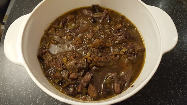 beef & mushroom filling in a deep dish stew in dish 2