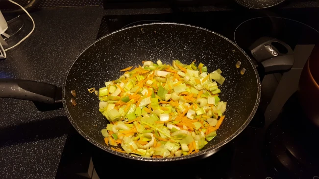 softening veg for the beef and mushroom pie filling veg in pan