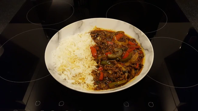 beef & pork madras served with rice madras rice plated