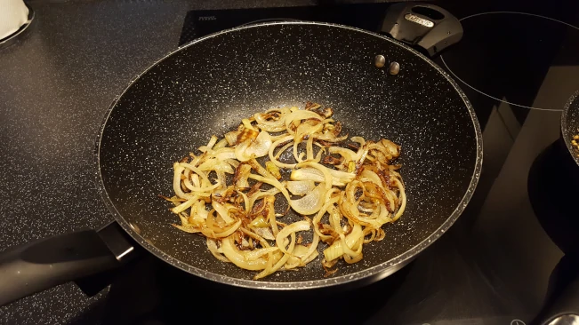 browning onions in a pan onions browning