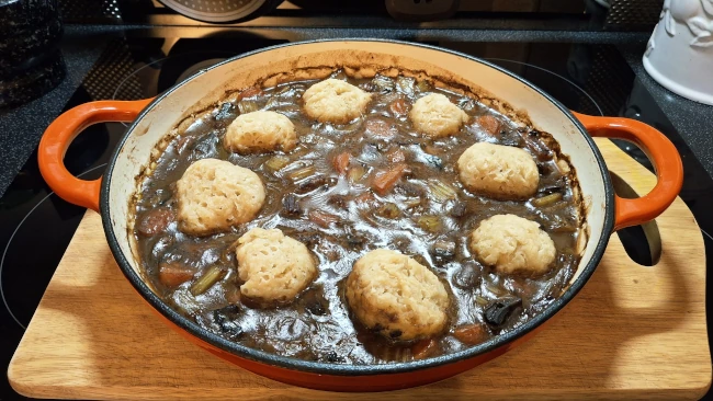 cooked beef stew and dumplings