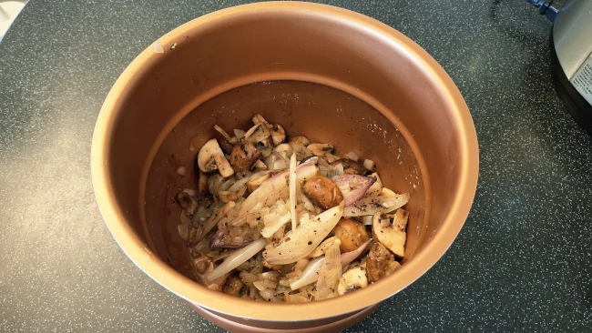 onions & mushrooms in a pot