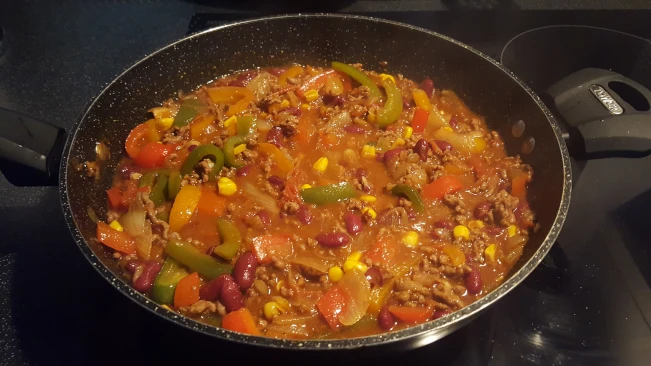 beef and pork chill cooked in a wok beef and pork chilli