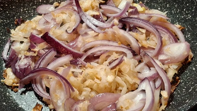 celeriac and onions browning in pan