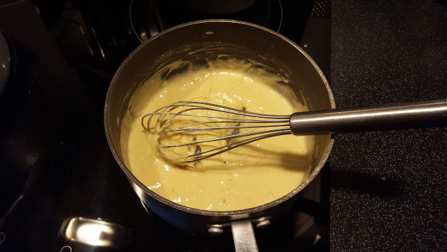cheese sauce in pan for beef and pork pasta bake cheese sauce in pan
