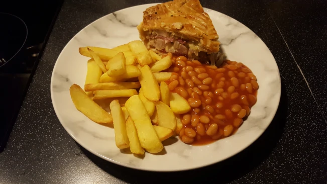 chicken & gammon pie served with chips & beans chicken and gammon pie chips and beans