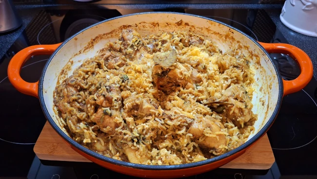 chicken biryani cooked in a dutch oven chicken biryani cooked