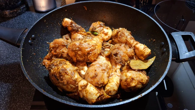 chicken drumsticks coated in spices for chicken biryani chicken drumsticks coated in spices