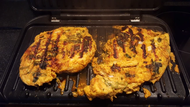 cooked chicken on grill