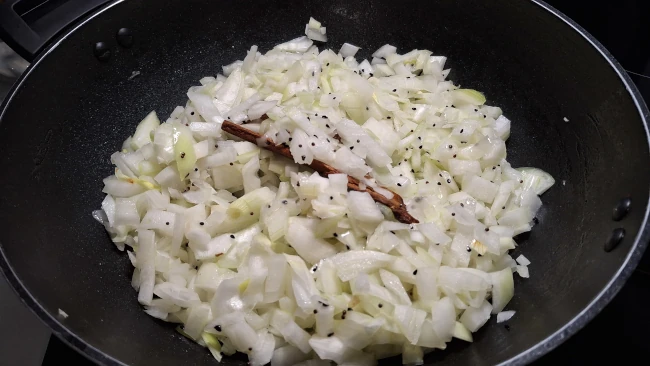 onions-and-seeds-mixed-in-a-pan