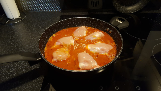 add chicken to pan