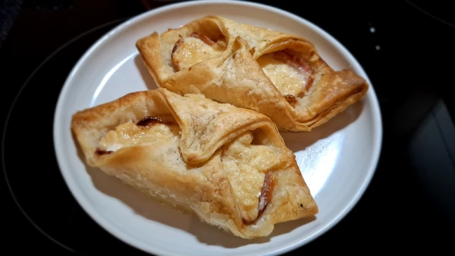 two-bacon-and-cheese-puffs-on-a-plate