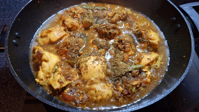 curry leaf masala added to pan for the 2nd time for curry leaf masala chicken fry curry leaf masala added to pan 02
