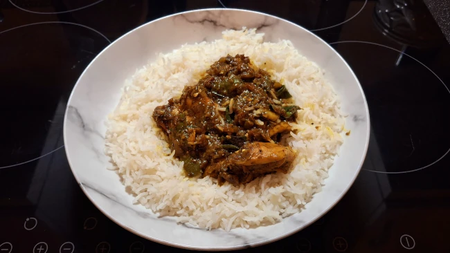 curry leaf masala chicken fry with basmati rice curry leaf masala cooked in a wok