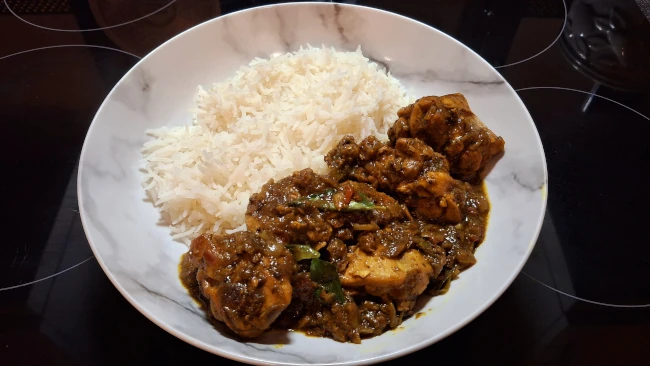 curry leaf masala cooked in a wok