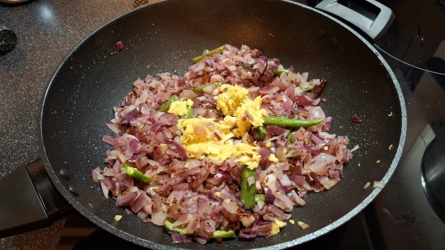 ginger added to pan for curry leaf masala chicken fry ginger added to pan