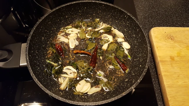spices frying for dhal with fried spices spices frying