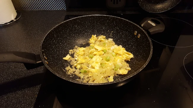 egg stirred through the rice stir egg through the rice
