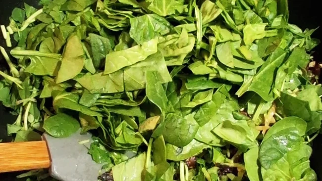 spinach added to pan