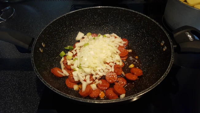 onions added to frying chorizo