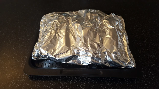fish wrapped in foil for mum's fish pie fish wrapped in foil