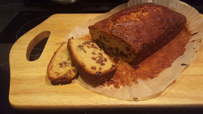sliced fruit cake on a chopping board fruit cake sliced 01