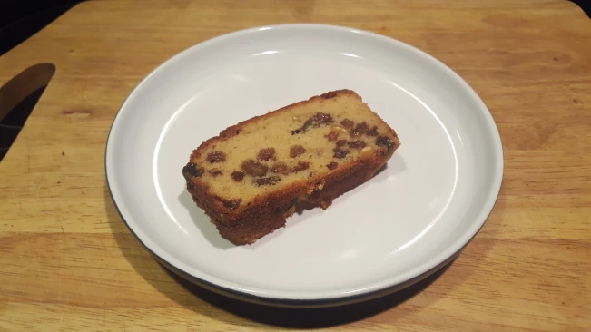 a slice fruit cake on a plate slice of cake on a plate