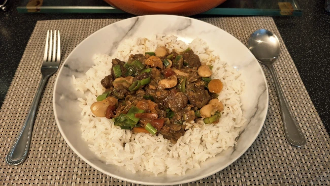 jamaican beef and butter bean curry and rice served in a dish jamaican beef and butter bean curry and rice