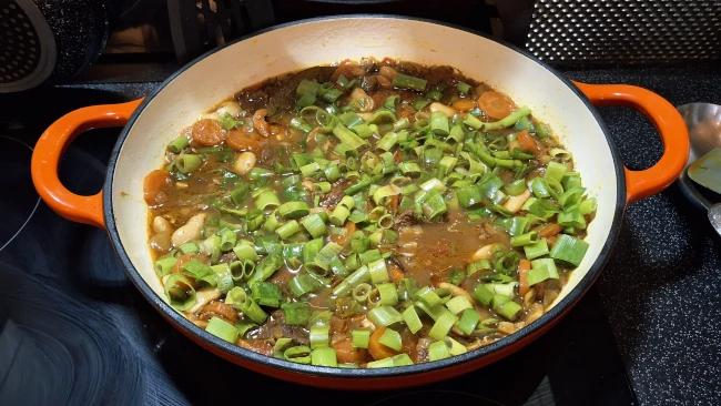spring onion greens added for jamaican beef & butter bean curry spring onion greens added