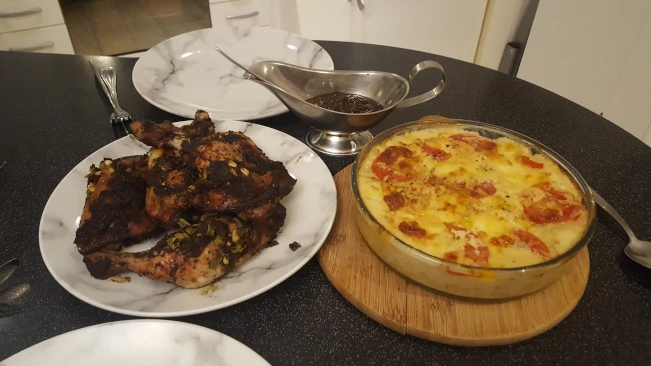 jerk chicken macaroni pie served 02