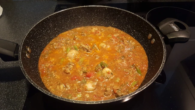 tomatoes added to jerked chicken curry tomatoes added 01