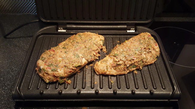 chicken breasts on grill