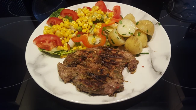 jerked pork steak plated