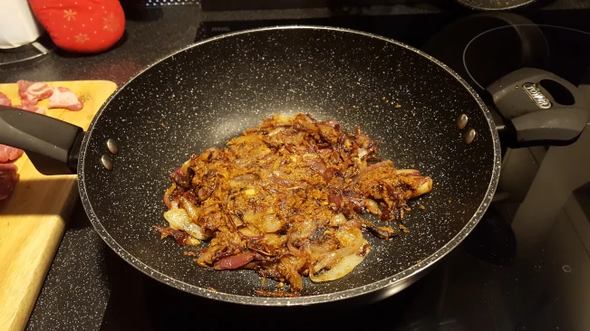 spice paste & onions cooking for lamb curry with spinach onions and spice paste cooking