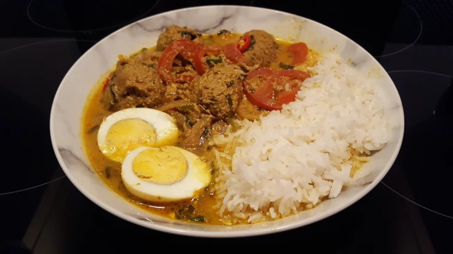 lamb kofta curry served with basmati rice lamb kofta curry and rice