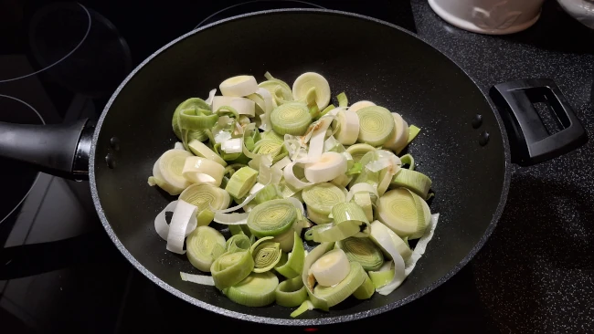 leeks in a pan for luxury chicken pie with mushrooms & leeks leeks in a pan