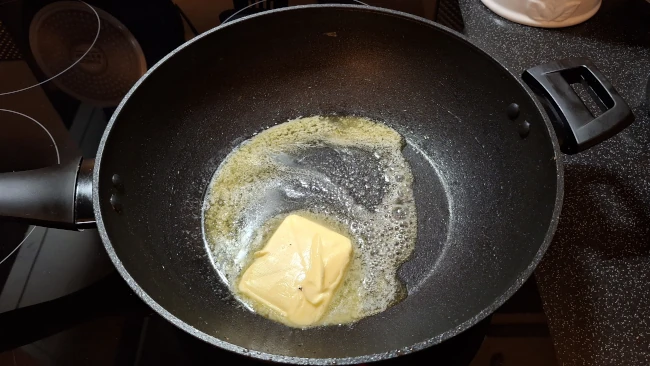 melting butter in a pan for luxury chicken pie with mushrooms & leeks melting butter in a pan