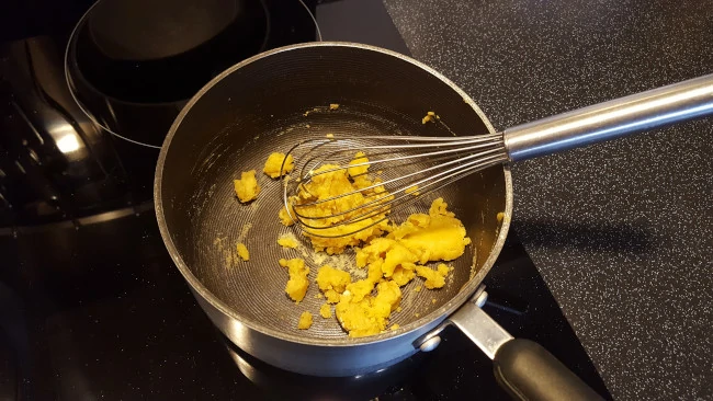making roux for macaroni cheese pie roux in pan