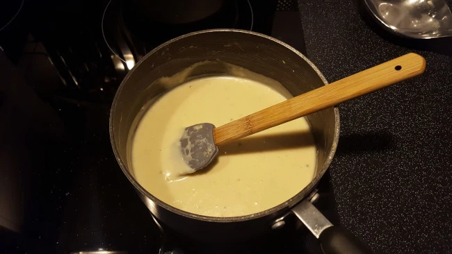 white sauce for macaroni pie white sauce in pan for macaroni pie