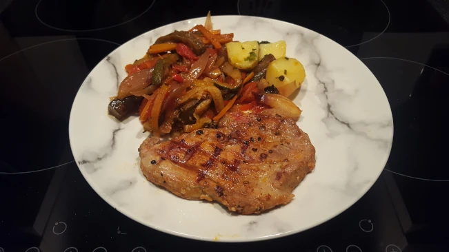Mediterranean style vegetables with grilled pork steak Mediterranean style vegetables with grilled pork steak