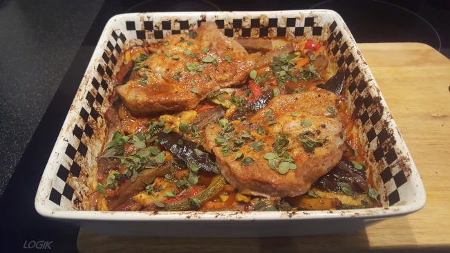 mediterranean style vegetables with pork steaks cooked & sprinkled with marjoram mediterranean style vegetables with pork steaks cooked