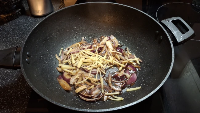 ginger and onions frying for mushroom chow mein ginger and onions frying