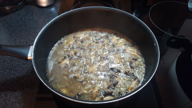 water added to pan for mushroom fried rice water added to pan