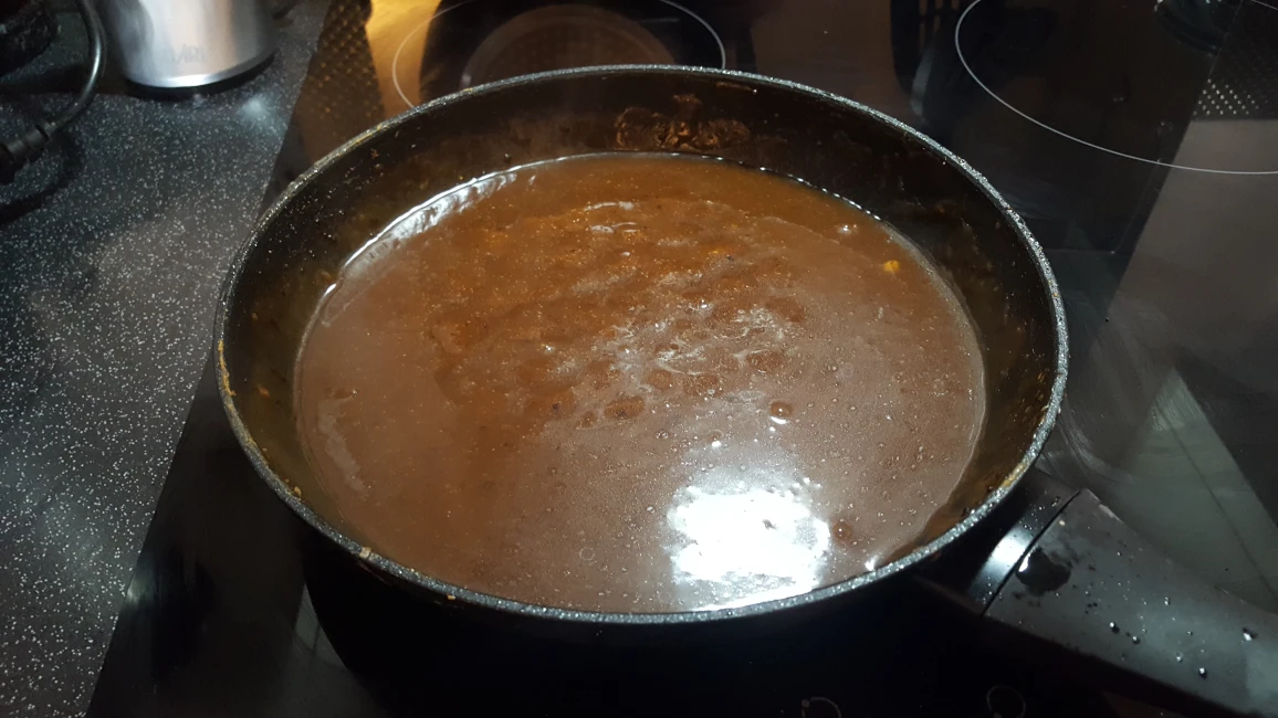 gravy in a pan for Nutty's braised steak gravy in a pan