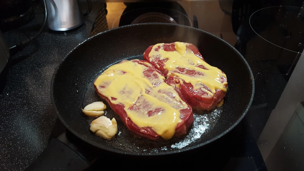 mustard coated steak frying for Nutty's braised steak mustard coated steak frying