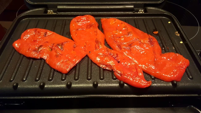 long red peppers grilling for peri peri pork steaks long peppers grilling